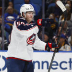 
              Columbus Blue Jackets left wing Eric Robinson celebrates his second goal during the second period of an NHL hockey game against the Buffalo Sabres, Tuesday, Feb. 28, 2023, in Buffalo, N.Y. (AP Photo/Jeffrey T. Barnes)
            