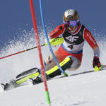 
              Switzerland's Wendy Holdener speeds down the course during the women's World Championship slalom, in Meribel, France, Saturday Feb. 18, 2023. (AP Photo/Alessandro Trovati)
            