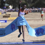 
              Brenda Chebet of Kenya crosses the finish line to win the mixed relay race at the World Athletics Cross Country Championships in Bathurst, Australia, Saturday, Feb. 18, 2023. (Dean Lewins/AAP Image via AP)
            