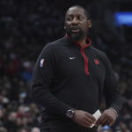 
              Toronto Raptors assistant coach Adrian Griffin takes charge of the team against the Detroit Pistons in NBA basketball game action in Toronto, Sunday, Feb. 12, 2023, after head coach Nick Nurse missed the game due to personal reasons. (Chris Young/The Canadian Press via AP)
            