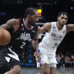 
              Los Angeles Clippers' Kawhi Leonard (2) drives past Brooklyn Nets' Cam Thomas (24) during the second half of an NBA basketball game, Monday, Feb. 6, 2023, in New York. The Clippers won 124-116. (AP Photo/Frank Franklin II)
            
