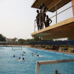 
              Two teams play water polo during an Awatu Winton Water Polo Club competition at the University of Ghana in Accra, Ghana, Saturday, Jan. 14, 2023. Former water polo pro Prince Asante is training young players in the sport in his father's homeland of Ghana, where swimming pools are rare and the ocean is seen as dangerous. (AP Photo/Misper Apawu)
            