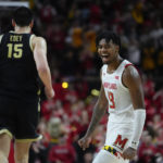 
              Maryland guard Hakim Hart (13) reacts after a basket as Purdue center Zach Edey (15) runs by during the second half of an NCAA college basketball game, Thursday, Feb. 16, 2023, in College Park, Md. Maryland won 68-54. (AP Photo/Julio Cortez)
            
