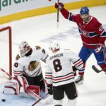 
              Montreal Canadiens' Joel Armia (40) celebrates a goal against Chicago Blackhawks goaltender Jaxson Stauber (30) as Chicago Blackhawks Jack Johnson (8) looks on during the first period an NHL hockey game Tuesday, Feb. 14, 2023 in Montreal. (Ryan Remiorz/The Canadian Press via AP)
            