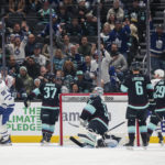 
              Toronto Maple Leafs center John Tavares (91) reacts after scoring a goal against Seattle Kraken goaltender Philipp Grubauer (31) during the first period of a NHL hockey game Sunday, Feb. 26, 2023, in Seattle. (AP Photo/Jason Redmond)
            