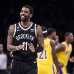 
              Brooklyn Nets guard Kyrie Irving (11) reacts during the second half of an NBA basketball game against the Los Angeles Lakers, Monday, Jan. 30, 2023, in New York. (AP Photo/Corey Sipkin)
            