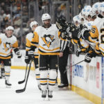 
              Pittsburgh Penguins' Pierre-Olivier Joseph (73) celebrates with teammates after his goal during the first period of an NHL hockey game against the Anaheim Ducks, Friday, Feb. 10, 2023, in Anaheim, Calif. (AP Photo/Jae C. Hong)
            