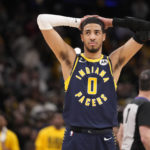 
              Indiana Pacers guard Tyrese Haliburton (0) reacts to a 112-11 loss to the Los Angeles Lakers in an NBA basketball game in Indianapolis, Thursday, Feb. 2, 2023. The Lakers defeated the Pacers 112-111. (AP Photo/Michael Conroy)
            