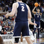 LAS VEGAS, NEVADA - MARCH 23: (EDITOR'S NOTE: Alternate crop) Julian Strawther #0 of the Gonzaga Bulldogs attempts a three-point basket to take the lead during the second half against the UCLA Bruins in the Sweet 16 round of the NCAA Men's Basketball Tournament at T-Mobile Arena on March 23, 2023 in Las Vegas, Nevada. (Photo by Carmen Mandato/Getty Images)