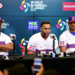 MIAMI, FLORIDA - MARCH 10: Jean Segura #2, Nelson Cruz #23 and Julio Rodríguez #44 of Team Dominican Republic speak to the media during a press conference prior to the World Baseball Classic at loanDepot park on March 10, 2023 in Miami, Florida. (Photo by Megan Briggs/Getty Images)
