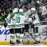 SEATTLE, WASHINGTON - MARCH 11: Ryan Suter #20 and Mason Marchment #27 of the Dallas Stars celebrate a goal during the second period against the Seattle Kraken at Climate Pledge Arena on March 11, 2023 in Seattle, Washington. (Photo by Steph Chambers/Getty Images)