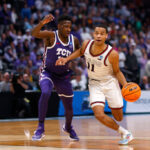DENVER, COLORADO - MARCH 19: Nolan Hickman #11 of the Gonzaga Bulldogs drives against Damion Baugh #10 of the TCU Horned Frogs during the second half in the second round of the NCAA Men's Basketball Tournament at Ball Arena on March 19, 2023 in Denver, Colorado. (Photo by Justin Edmonds/Getty Images)