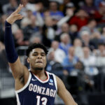 LAS VEGAS, NEVADA - MARCH 23: Malachi Smith #13 of the Gonzaga Bulldogs reacts after scoring a three-point basket against the UCLA Bruins during the second half in the Sweet 16 round of the NCAA Men's Basketball Tournament at T-Mobile Arena on March 23, 2023 in Las Vegas, Nevada. (Photo by Carmen Mandato/Getty Images)