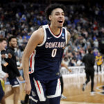LAS VEGAS, NEVADA - MARCH 23: Julian Strawther #0 of the Gonzaga Bulldogs reacts after defeating the UCLA Bruins 79-76 during the Sweet 16 round of the NCAA Men's Basketball Tournament at T-Mobile Arena on March 23, 2023 in Las Vegas, Nevada. (Photo by Carmen Mandato/Getty Images)