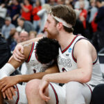 LAS VEGAS, NEVADA - MARCH 25: Drew Timme #2 of the Gonzaga Bulldogs reacts with Malachi Smith #13 on the bench during the second half against the Connecticut Huskies in the Elite Eight round of the NCAA Men's Basketball Tournament at T-Mobile Arena on March 25, 2023 in Las Vegas, Nevada. (Photo by Carmen Mandato/Getty Images)