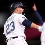 SEATTLE, WASHINGTON - MARCH 30: Ty France #23 of the Seattle Mariners celebrates his three run home run against the Cleveland Guardians during the eighth inning during Opening Day at T-Mobile Park on March 30, 2023 in Seattle, Washington. (Photo by Steph Chambers/Getty Images)