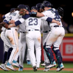 SEATTLE, WASHINGTON - MARCH 30: The Seattle Mariners celebrate their 3-0 win against the Cleveland Guardians during Opening Day at T-Mobile Park on March 30, 2023 in Seattle, Washington. (Photo by Steph Chambers/Getty Images)