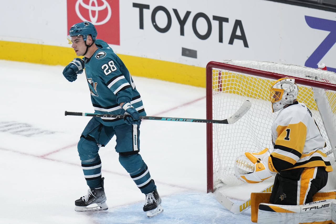 San Jose Sharks right wing Timo Meier, left, celebrates after scoring a goal against Pittsburgh Pen...