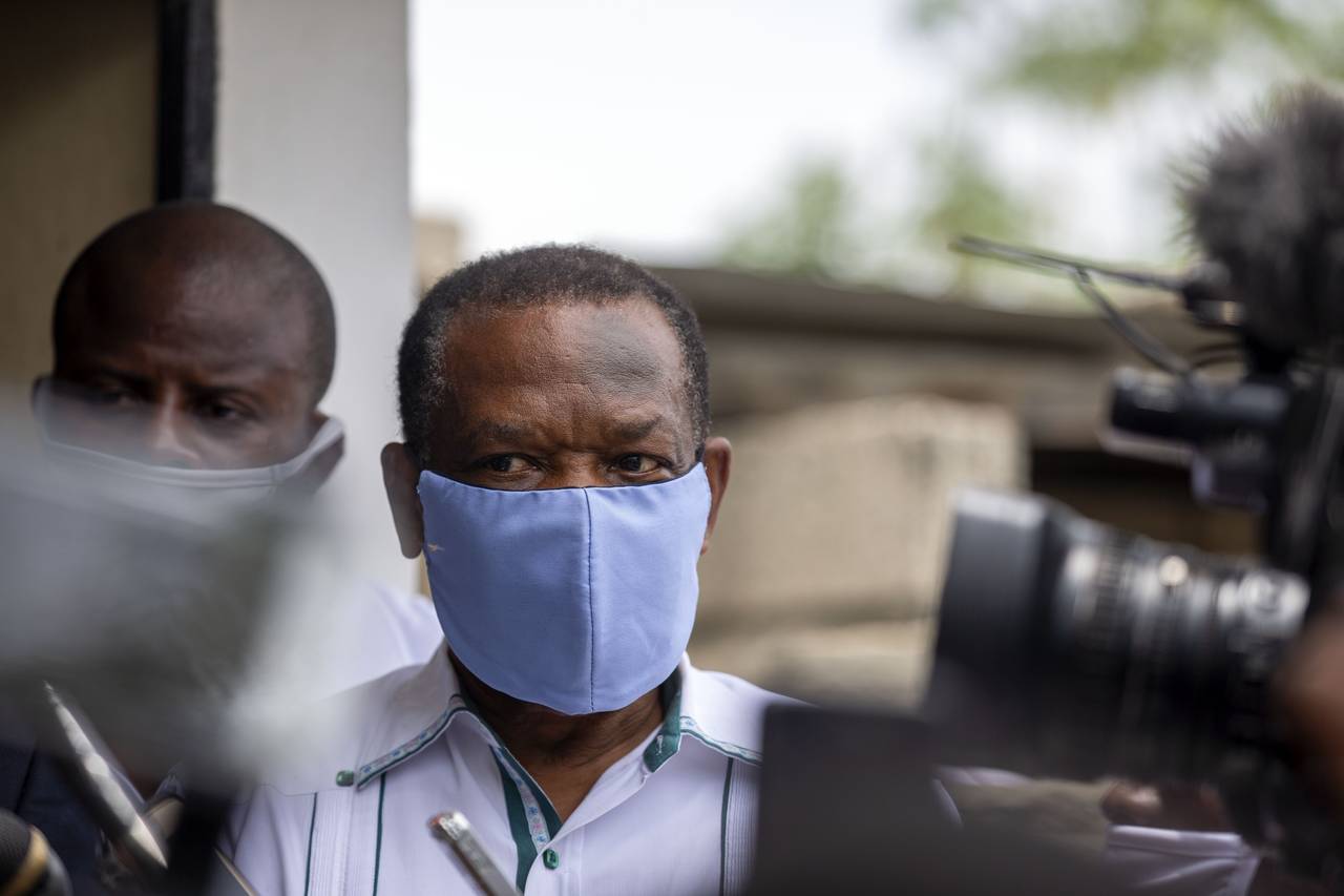 FILE -  Yves Jean-Bart, president of the Haitian Football Federation, wearing a protective face mas...