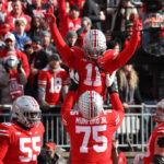 COLUMBUS, OHIO - NOVEMBER 20: Jaxon Smith-Njigba #11 of the Ohio State Buckeyes celebrates a first half touchdown with Thayer Munford #75 while playing the Michigan State Spartans at Ohio Stadium on November 20, 2021 in Columbus, Ohio. (Photo by Gregory Shamus/Getty Images)