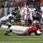COLUMBUS, OHIO - SEPTEMBER 17: Jaxon Smith-Njigba #11 of the Ohio State Buckeyes makes a diving catch during the second quarter of a game against the Toledo Rockets at Ohio Stadium on September 17, 2022 in Columbus, Ohio. (Photo by Ben Jackson/Getty Images)