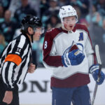 SEATTLE, WASHINGTON - APRIL 24: Cale Makar #8 of the Colorado Avalanche looks on after his penalty after checking Jared McCann #19 of the Seattle Kraken during the first period in Game Four of the First Round of the 2023 Stanley Cup Playoffs at Climate Pledge Arena on April 24, 2023 in Seattle, Washington. (Photo by Steph Chambers/Getty Images)