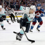 DENVER, COLORADO - APRIL 30: Yanni Gourde #37 of the Seattle Kraken advances the puck against the Colorado Avalanche in Game Seven of the First Round of the 2023 Stanley Cup Playoffs at Ball Arena on April 30, 2023 in Denver, Colorado. (Photo by Matthew Stockman/Getty Images)