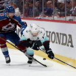 DENVER, COLORADO - APRIL 30: Devon Toews #7 of the Colorado Avalanche fights for the puck against Jaden Schwartz #17 of the Seattle Kraken in the first period in Game Seven of the First Round of the 2023 Stanley Cup Playoffs at Ball Arena on April 30, 2023 in Denver, Colorado. (Photo by Matthew Stockman/Getty Images)