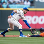 SEATTLE, WA - MAY 07: Second baseman Jose Caballero #76 of the Seattle Mariners tags out Kyle Tucker #30 of the Houston Astros, who was trying to steal second base during the second inning of a game at T-Mobile Park on May 7, 2023 in Seattle, Washington. (Photo by Stephen Brashear/Getty Images)