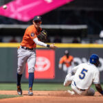 SEATTLE, WA - MAY 07: Second baseman Mauricio Dubon #14 of the Houston Astros turns a double play after forcing out Taylor Trammell #5 of the Seattle Mariners at second base during the fourth inning of a game at T-Mobile Park on May 7, 2023 in Seattle, Washington. (Photo by Stephen Brashear/Getty Images)