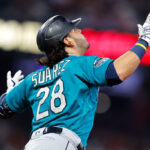 ATLANTA, GA - MAY 20: Eugenio Suarez #28 of the Seattle Mariners reacts after a two run home run during the seventh inning against the Atlanta Braves at Truist Park on May 20, 2023 in Atlanta, Georgia. (Photo by Todd Kirkland/Getty Images)