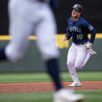 SEATTLE, WA - MAY 22: Jarred Kelenic #10 of the Seattle Mariners rounds the bases on his two-run home run off starting pitcher Kyle Muller of the Oakland Athletics during the first inning at T-Mobile Park on May 22, 2023 in Seattle, Washington. (Photo by Stephen Brashear/Getty Images)