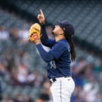 SEATTLE, WA - MAY 22: Starting pitcher Luis Castillo #58 of the Seattle Mariners gestures after registering his 1,000th career strike out in the fifth inning against the Oakland Athletics at T-Mobile Park on May 22, 2023 in Seattle, Washington. (Photo by Stephen Brashear/Getty Images)