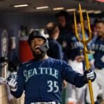 SEATTLE, WA - MAY 24: Teoscar Hernandez #35 of the Seattle Mariners celebrates in the dugout after hitting a solo home run during the seventh inning against the Oakland Athletics at T-Mobile Park on May 24, 2023 in Seattle, Washington. (Photo by Stephen Brashear/Getty Images)