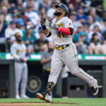 SEATTLE, WA - MAY 26: Carlos Santana #41 of the Pittsburgh Pirates celebrates while rounding the bases after hittinga solo home run off starting pitcher George Kirby #68 of the Seattle Mariners during the fourth inning of a game at T-Mobile Park on May 26, 2023 in Seattle, Washington. (Photo by Stephen Brashear/Getty Images)
