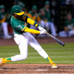 OAKLAND, CALIFORNIA - MAY 02: Esteury Ruiz #1 of the Oakland Athletics hits an RBI double scoring Tony Kemp #5 against the Seattle Mariners in the bottom of the six inning at RingCentral Coliseum on May 02, 2023 in Oakland, California. (Photo by Thearon W. Henderson/Getty Images)