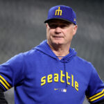 SEATTLE, WASHINGTON - MAY 05: Manager Scott Servais #9 of the Seattle Mariners looks on during batting practice before the game against the Houston Astros at T-Mobile Park on May 05, 2023 in Seattle, Washington. (Photo by Steph Chambers/Getty Images)