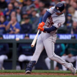 SEATTLE, WASHINGTON - MAY 06: Kyle Tucker #30 of the Houston Astros hits a sacrifice fly to score Mauricio Dubon #14 during the fourth inning against the Seattle Mariners at T-Mobile Park on May 06, 2023 in Seattle, Washington. (Photo by Steph Chambers/Getty Images)