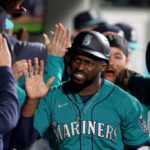 SEATTLE, WASHINGTON - MAY 06: Taylor Trammell #5 of the Seattle Mariners celebrates his run against the Houston Astros during the eighth inningat T-Mobile Park on May 06, 2023 in Seattle, Washington. (Photo by Steph Chambers/Getty Images)
