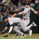 SEATTLE, WASHINGTON - MAY 06: Jeremy Pena #3 and Alex Bregman #2 of the Houston Astros collide while fielding a ball against the Seattle Mariners during the eighth inning at T-Mobile Park on May 06, 2023 in Seattle, Washington. (Photo by Steph Chambers/Getty Images)