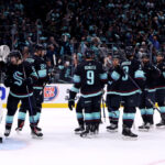 SEATTLE, WASHINGTON - MAY 07: The Seattle Kraken celebrate their 7-2 win against the Dallas Stars in Game Three of the Second Round of the 2023 Stanley Cup Playoffs at Climate Pledge Arena on May 07, 2023 in Seattle, Washington. (Photo by Steph Chambers/Getty Images)