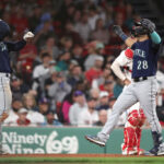 BOSTON, MASSACHUSETTS - MAY 15: Eugenio Suarez #28 of the Seattle Mariners celebrates his two-run home run that scored Jarred Kelenic #10 in the eighth inning against the Boston Red Sox at Fenway Park on May 15, 2023 in Boston, Massachusetts. (Photo by Paul Rutherford/Getty Images)