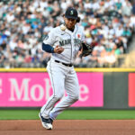 SEATTLE, WASHINGTON - MAY 29: Eugenio Suarez #28 of the Seattle Mariners reacts to bobbling the ball during the fifth inning against the New York Yankees at T-Mobile Park on May 29, 2023 in Seattle, Washington. (Photo by Alika Jenner/Getty Images)