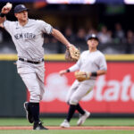 SEATTLE, WASHINGTON - MAY 31: DJ LeMahieu #26 of the New York Yankees makes a play during the third inning against the Seattle Mariners at T-Mobile Park on May 31, 2023 in Seattle, Washington. (Photo by Steph Chambers/Getty Images)