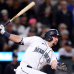 SEATTLE, WASHINGTON - MAY 31: Cal Raleigh #29 of the Seattle Mariners watches his walk-off single during the tenth inning against the New York Yankees at T-Mobile Park on May 31, 2023 in Seattle, Washington. (Photo by Steph Chambers/Getty Images)