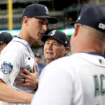 SEATTLE, WASHINGTON - MAY 31: George Kirby #68 of the Seattle Mariners is greeted by manager Scott Servais #9 during the eighth inning against the New York Yankees at T-Mobile Park on May 31, 2023 in Seattle, Washington. (Photo by Steph Chambers/Getty Images)