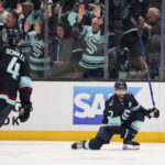 Seattle Kraken right wing Jordan Eberle (7) reacts after scoring against the Dallas Stars as teammate Justin Schultz (4) looks on during the second period of Game 3 of an NHL hockey Stanley Cup second-round playoff series Sunday, May 7, 2023, in Seattle. (AP Photo/Lindsey Wasson)Credit: ASSOCIATED PRESS