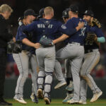 ANAHEIM, CALIFORNIA - JUNE 10: The Seattle Mariners celebrate after the final out of the ninth inning defeating the Los Angeles Angels at Angel Stadium of Anaheim on June 10, 2023 in Anaheim, California. (Photo by Jayne Kamin-Oncea/Getty Images)