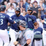 SEATTLE, WASHINGTON - JUNE 12: Ty France #23 of the Seattle Mariners celebrates his three run home run with Teoscar Hernandez #35, Julio Rodriguez #44 and J.P. Crawford #3 during the second inning against the Miami Marlins at T-Mobile Park on June 12, 2023 in Seattle, Washington. (Photo by Steph Chambers/Getty Images)