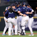 SEATTLE, WASHINGTON - JUNE 12: The Seattle Mariners celebrate their 8-1 win against the Miami Marlins at T-Mobile Park on June 12, 2023 in Seattle, Washington. (Photo by Steph Chambers/Getty Images)